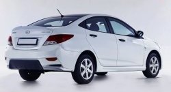 10 999 р. Задний бампер Sport  Hyundai Solaris  1 седан (2010-2014) (Неокрашенный). Увеличить фотографию 1