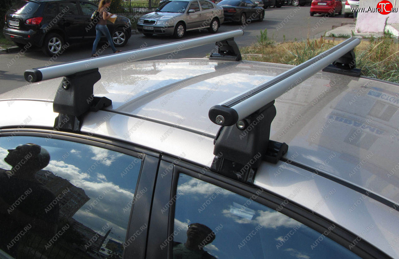 2 999 р. Багажник на крышу INTER D-1 (в обхват дверного проема) Mitsubishi Pajero Sport 1 PA дорестайлинг (1996-2004) (Cтальные поперечины длиной 1200 мм, без обтекателей)
